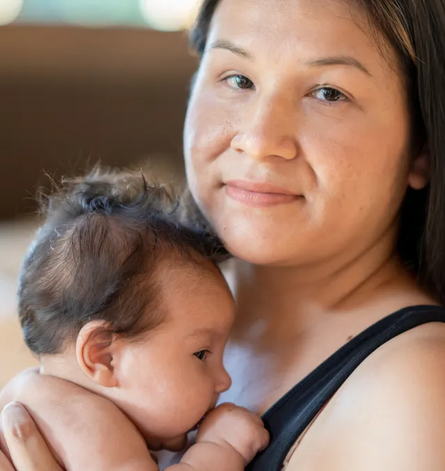 Native American Woman holding a baby